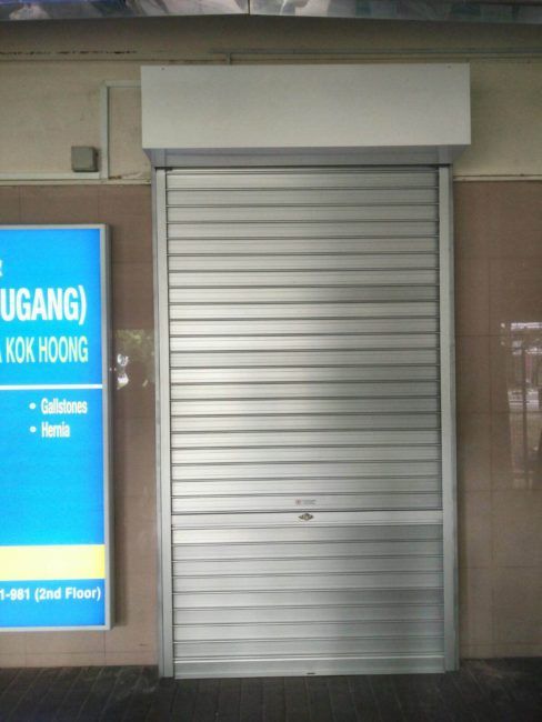 Supplied and Installed Manual Aluminium Roller Shutters for Hougang Clinic Entrance