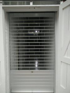 Aluminium Roller Grille with Flats Slats at the Bottom Area Installed for Factory