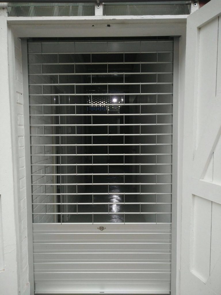 Aluminium Roller Grille with Flats Slats at the Bottom Area Installed for Factory