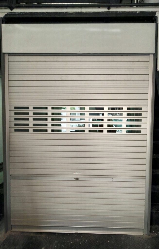 Dismantled Folding Door and Installed Brand New Manually Operated Aluminium Roller Shutters with Viewing Panel