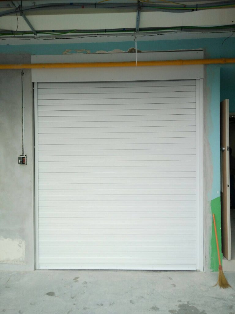 Motorised Operated Aluminium Roller Shutters in White Powder Coated Finishing for Front Entrance of Pre-School at Ang Mo Kio