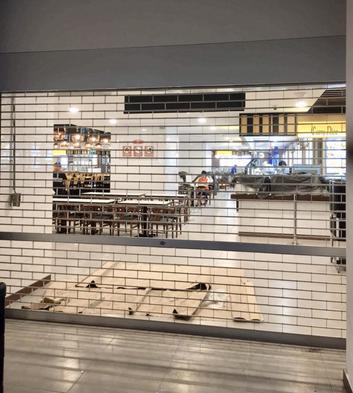 Two Sets of Manually Operated Aluminium Roller Grille for Food Court Entrance at Raffles Hospital