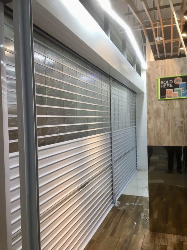 Manually Operated Top Multi-Vision Panel and Bottom Aluminium (Powder Coated Finishing) Roller Shutter for Supermarket at Yishun