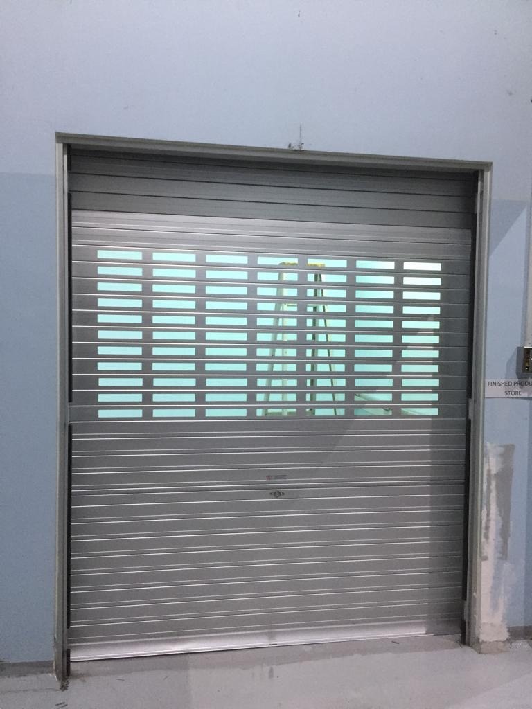 Replaced 3 Sets of Metal Swing Door with New Manually Operated Aluminium Roller Shutter with Viewing Panels at Senoko Avenue